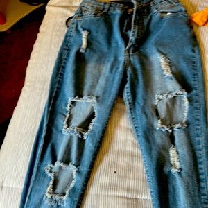 Juniors high waist shredded jeans